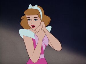 Cinderella shocked when Drizella rips the beads off her neck.