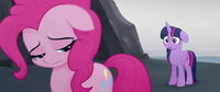 Pinkie, deeply hurt by Twilight's words, sadly walks away from her.