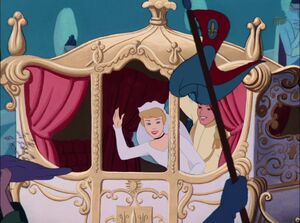 Cinderella and Prince Charming at their wedding, waving goodbye to the King, the Grand Duke, Jaq and Gus, and the kingdom's citizens.