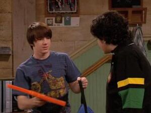 Drake and Josh making up for fighting and Drake giving Josh the foam finger as an apology