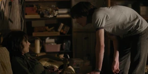 Joyce being woken up by Jonathan the next morning.