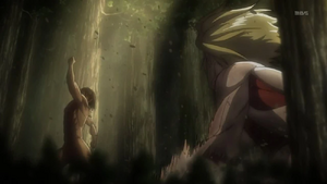 Eren punches Annie into the tree