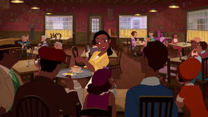 Tiana greeting her friends at a table.