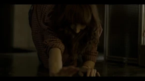 Joyce grabbing Hopper's gun after it fell out of his hands.