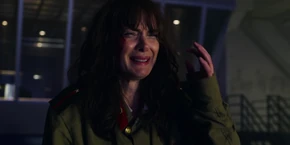 Joyce beginning to sob, believing Hopper had died.