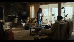 The next day, Joyce shows Murray the message after he arrives in California.