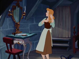 Cinderella brushing her hair.