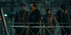 Joyce watching the Demogorgon beginning to slaughter the prisoners.