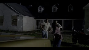 Joyce, Hopper, and Alexei running to the police car.