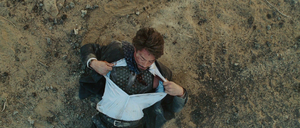 Tony wounded after being ambushed by the Ten Rings.