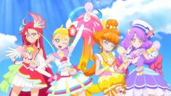 Tropica ING Cures pose while holding their Ocean Prism Mirrors.jpg