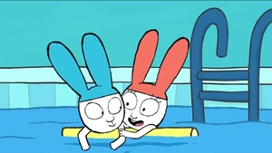 Lou holding onto Simon while voicing her amazement at his strength