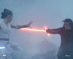 Rey stops Kylo's saber