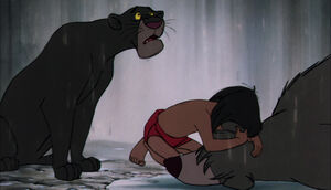 Bagheera comforting Mowgli