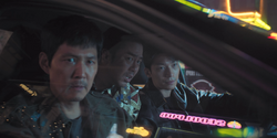 Squid Game 2 - Gi-hun, Woo-seok and Jun-ho outside the club EP2