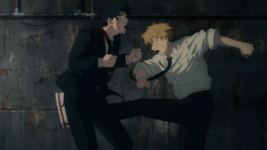 Denji kicks Aki between the legs