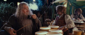 Gandalf having Pippin and Merry wash dishes as punishment.