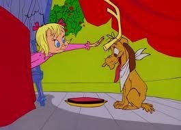 Cindy pats Max after giving him a roast beast