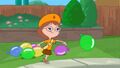 Gretchen throws a water balloon.