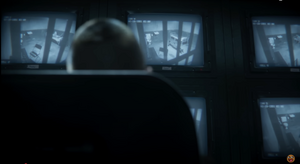 Weaver, Grey, Strauss, Carver and Raptor One in their cells on CCTV being watched by The Project Janus Security Guard.
