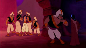 Jasmine hearing Razoul explain he is on Jafar's orders to arrest Aladdin.