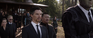 Doctor Strange and Wong attend Stark's funeral.
