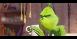 The Grinch trying to enjoy his morning coffee