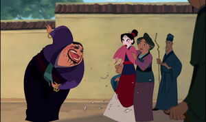 Mulan being openly berated by the Matchmaker.