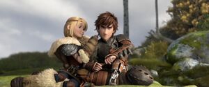 Astrid braiding Hiccup's hair...