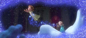 A memory of Elsa using her magic to play with Anna being altered by Pabbie.