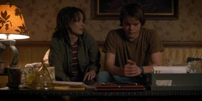 Admiring Jonathan's photographs, Joyce apologizes to her son for not paying more attention to him.