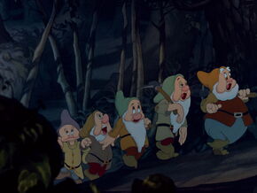 Grumpy and the dwarfs returning home.