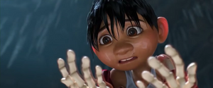 Miguel looking at his skeletal hands, realizing his fate.