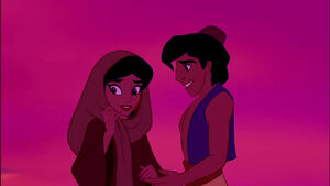 Aladdin being thanked by Jasmine for saving her from the vendor.