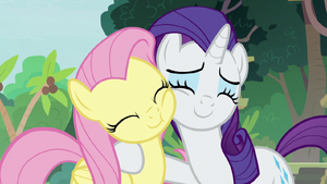 Fluttershy and Rarity nuzzling cheeks S8E4