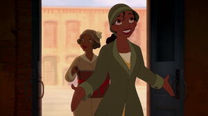 Tiana and her mother entering an abandoned sugar mill which Tiana wants to turn into her restaurant.