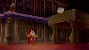 Mrs. Potts talking to Cogsworth.
