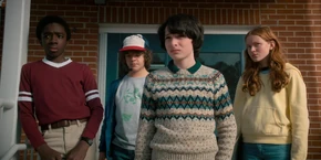 After Will wakes up from his trance, Lucas and his friends watch Will leave the school with his mom.