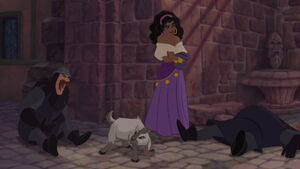 Djali rescuing and protecting Esmeralda from some cruel soldiers.