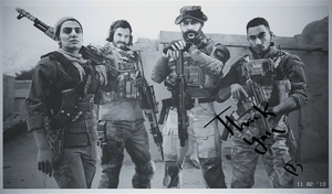 Farah, Price, Alex, and Garrick on the "thank you" photo.