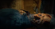 Krafft's corpse while Weaver and the team leave the castle.