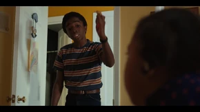 Lucas ordering Erica to stay out of his room after discovering she took his He-Man action figure.