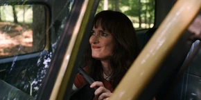 Joyce trying to start the car again.