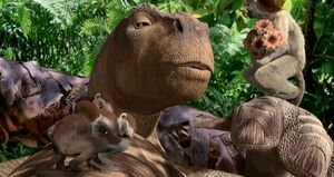 Aladar with his adoptive lemur family