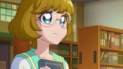 TRPC04 Minori holds the book close to her chest.jpg