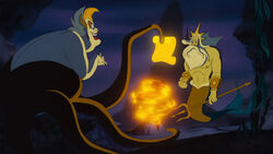 Triton being asked by Ursula if he agrees to take Ariel's place in her bargain.