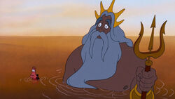 After Ursula's death, King Triton finds Ariel sadly looking at Eric who risked his life to save his daughter.