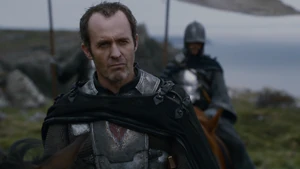 Stannis glares at Renly.