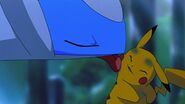 Latios licks Pikachu.