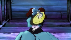 Baby Lisa Lisa in the arms of her dead mother